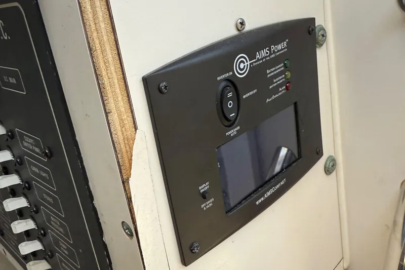 Slide: The Image of AIMS Power inverter panel on 1996 Grady-White Marlin 300 boat. - 27