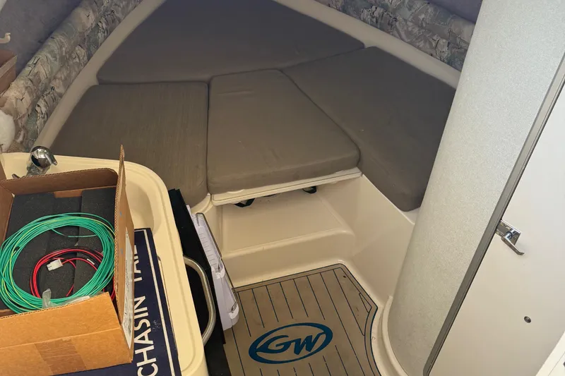 Slide: The Image of Interior cabin of a 1996 Grady-White Marlin 300 boat with cushions and wiring box. - 29