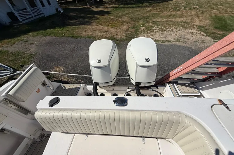 Slide: The Image of 1996 Grady-White Marlin 300 boat with dual outboard engines, viewed from above. - 38