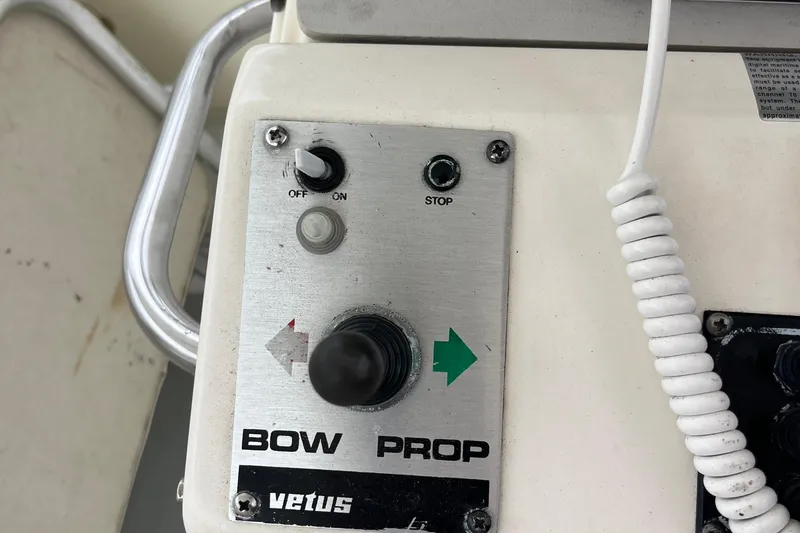 Slide: The Image of Control panel of a 1989 Albin 32 Sportfisher boat with bow propeller switch. - 18