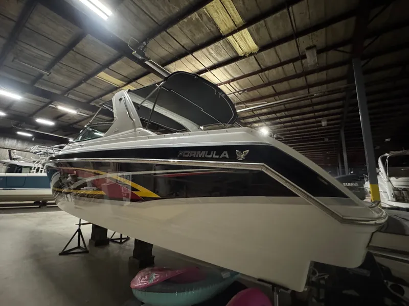 Slide: The Image of 2006 Formula 330 SunSport boat in warehouse - 12