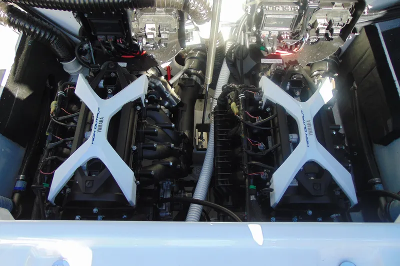 Slide: The Image of 2026 Yamaha Boats 222XD engine compartment with dual high-output engines. - 16
