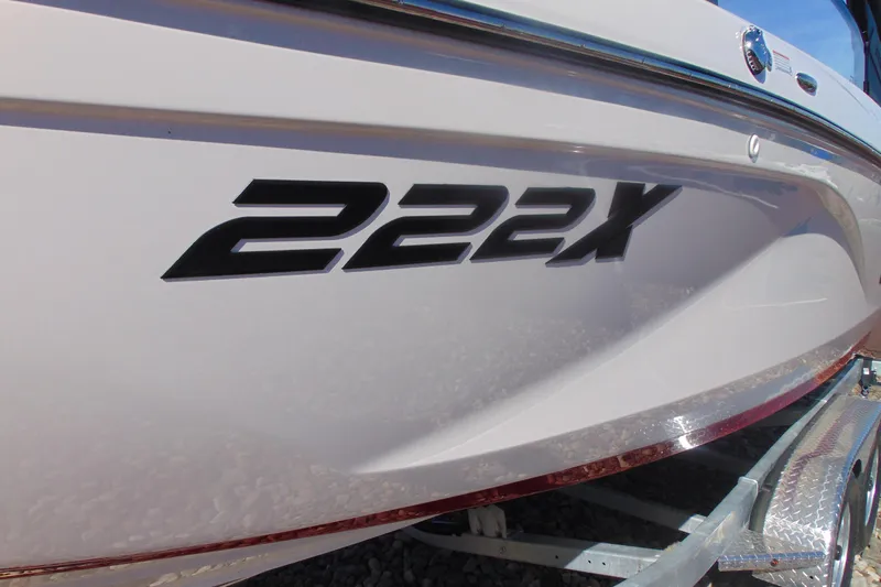 Slide: The Image of 2026 Yamaha Boats 222XD model, side view with "222X" decal. - 17