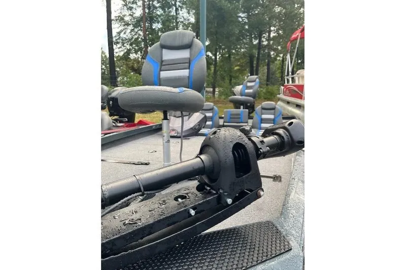 Slide: The Image of 2025 Ranger RT188P boat interior with wet deck and blue-accented seats. - 6