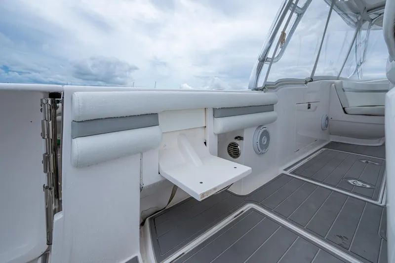 Slide: The Image of 2019 Intrepid 407 Cuddy boat interior with seating and deck details. - 49