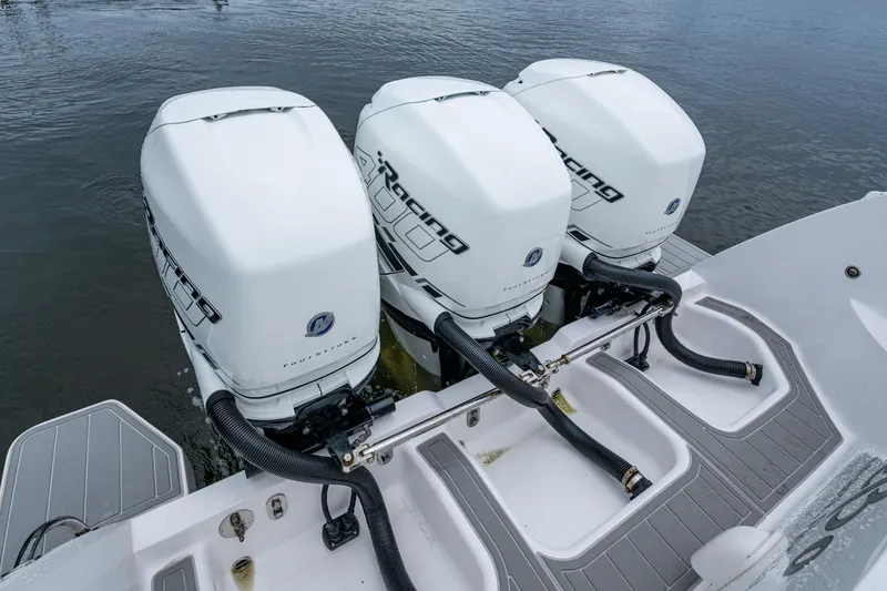 Slide: The Image of 2019 Intrepid 407 Cuddy with triple outboard engines on water. - 54