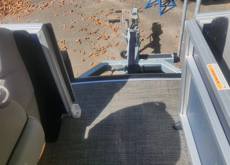 Slide: The Image of 2025 Barletta ARIA 22UC pontoon boat on trailer. - 11