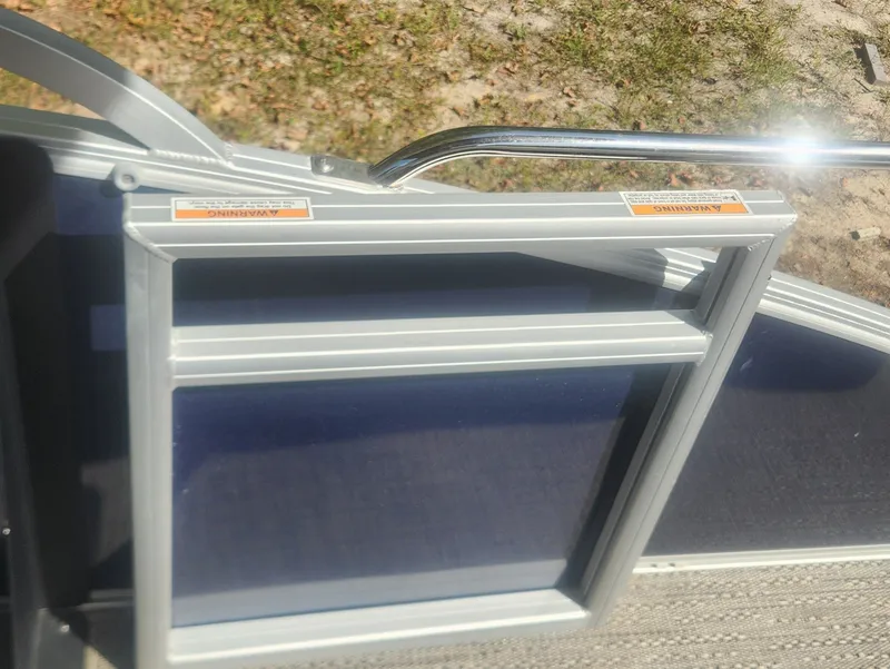 Slide: The Image of 2025 Barletta ARIA 22UC pontoon boat with canopy, side view. - 14