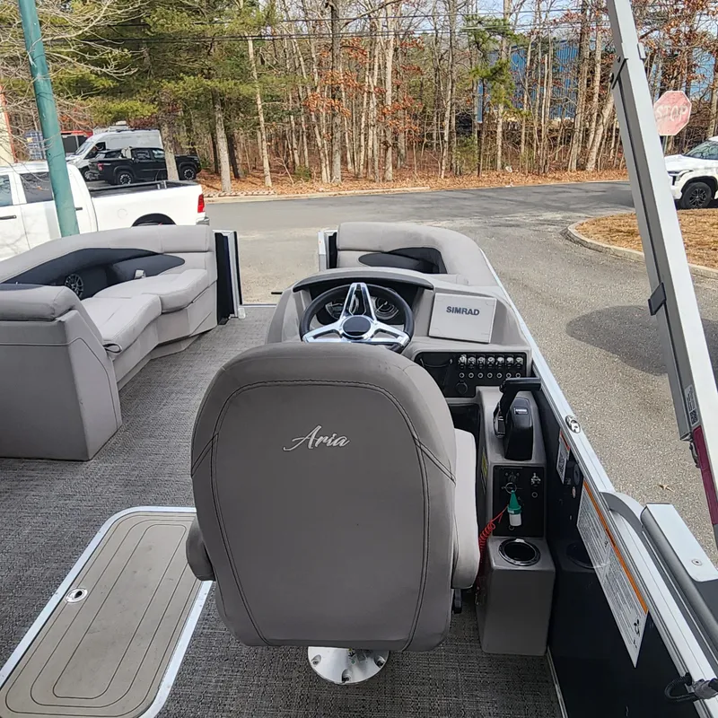 Slide: The Image of Interior of 2025 Barletta ARIA 22UC with gray seating and steering wheel. - 29