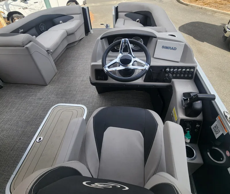 Slide: The Image of Interior of 2025 Barletta ARIA 22UC with steering wheel and seats. - 31