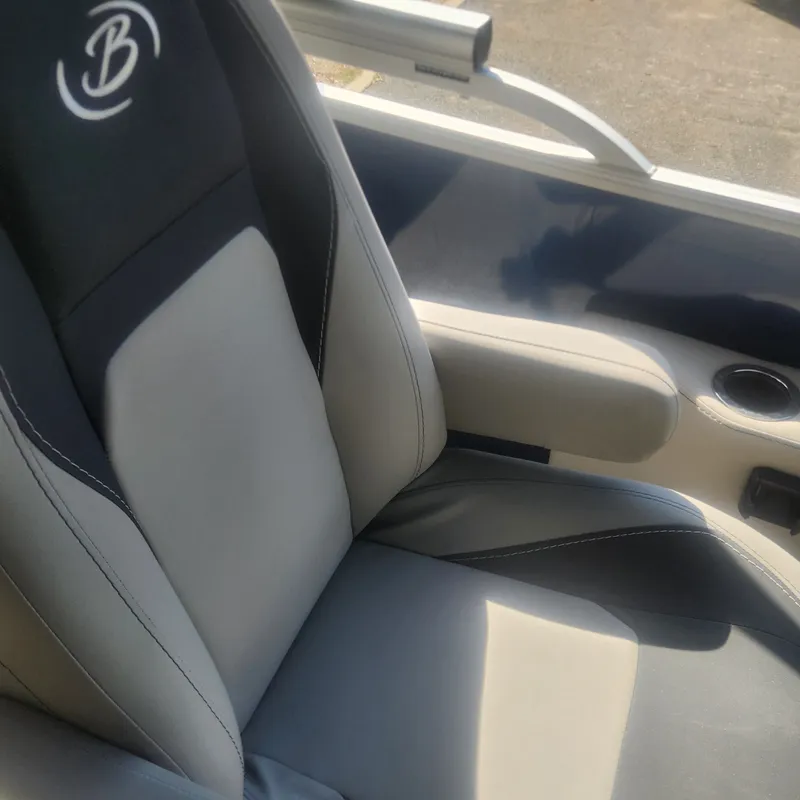 Slide: The Image of 2025 Barletta ARIA 22UC pontoon boat on trailer. - 6