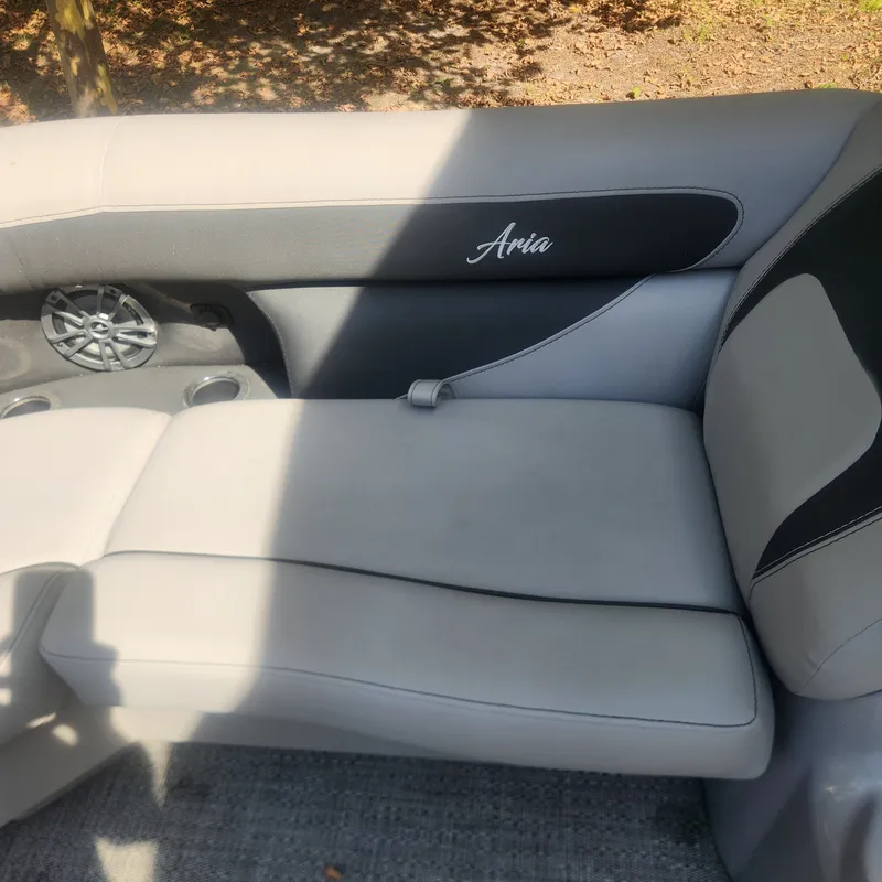 Slide: The Image of 2025 Barletta ARIA 22UC pontoon boat on trailer. - 9