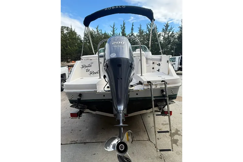 Slide: The Image of 2021 Robalo R227 Dual Console boat with Yamaha 200 engine, rear view. - 5