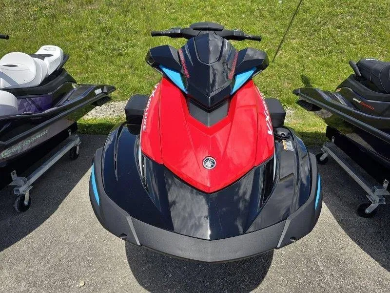 Slide: The Image of 2026 Yamaha Waverunner VX Deluxe with Audio, red and black, on pavement. - 35