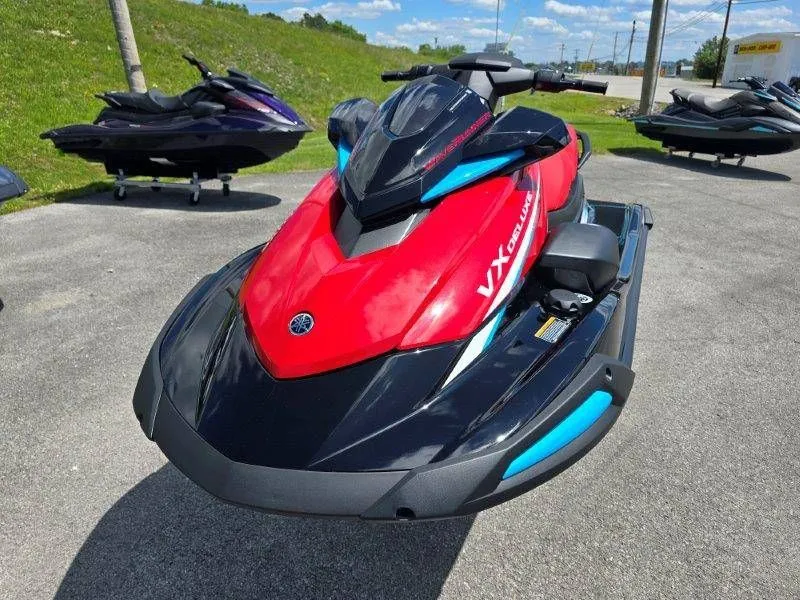 Slide: The Image of 2026 Yamaha Waverunner VX Deluxe with Audio, red and black, on parking lot. - 37