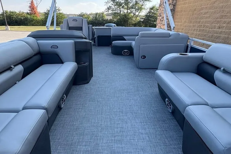 Slide: The Image of 2026 Sun Tracker SportFish 22 DLX pontoon boat interior with spacious seating and modern design. - 3