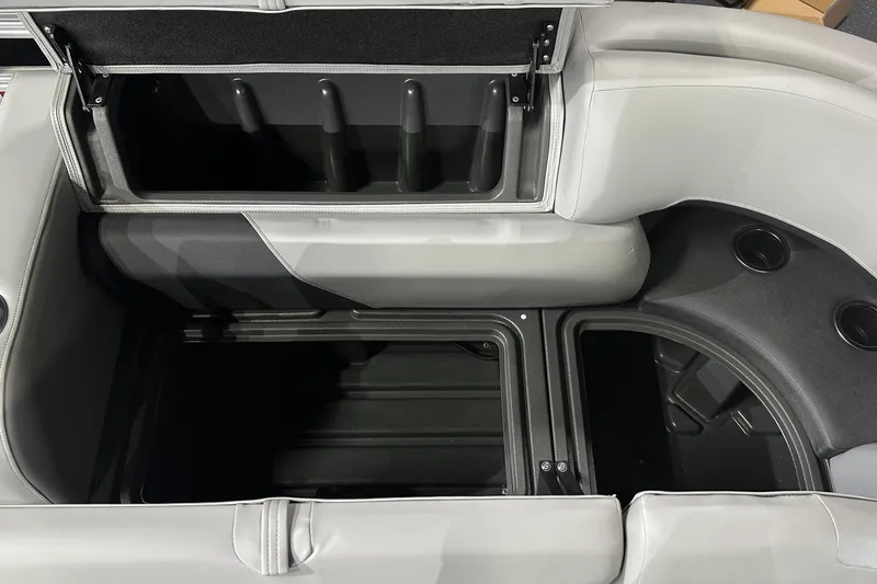 Slide: The Image of Interior storage compartments of 2026 Sun Tracker SportFish 22 DLX boat. - 18