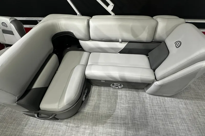 Slide: The Image of 2026 Sun Tracker SportFish 22 DLX interior seating, featuring sleek gray upholstery and modern design. - 22