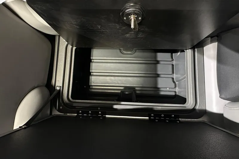 Slide: The Image of Storage compartment in 2026 Sun Tracker SportFish 22 DLX boat. - 25
