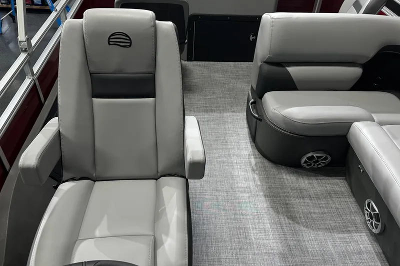 Slide: The Image of 2026 Sun Tracker SportFish 22 DLX interior with gray seating and modern design. - 28