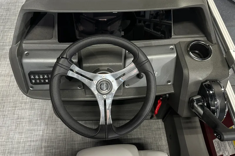Slide: The Image of Steering console of 2026 Sun Tracker SportFish 22 DLX pontoon boat. - 29