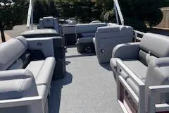 Slide: The Image of 2026 Sun Tracker SportFish 22 DLX pontoon boat with spacious seating and modern design. - 3