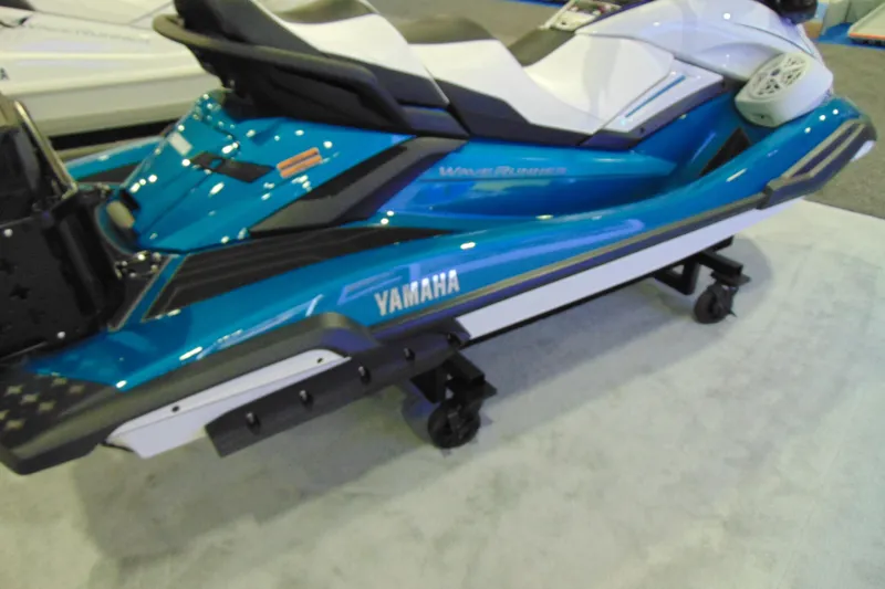 Slide: The Image of 2026 Yamaha WaveRunner FX Cruiser HO in blue on display indoors. - 8