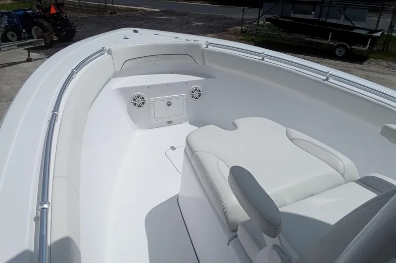 Slide: The Image of 2020 Sportsman Open 282TE Center Console boat interior with seating and speakers. - 22
