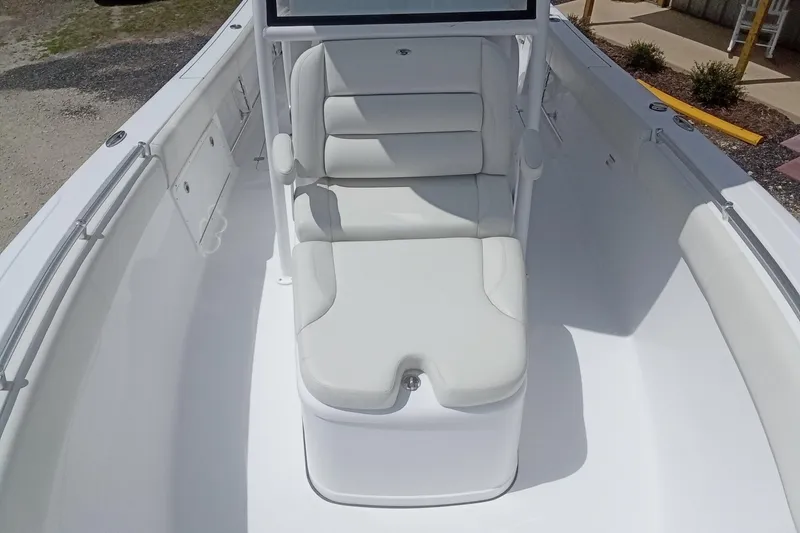 Slide: The Image of 2020 Sportsman Open 282TE Center Console boat with cushioned seating. - 25