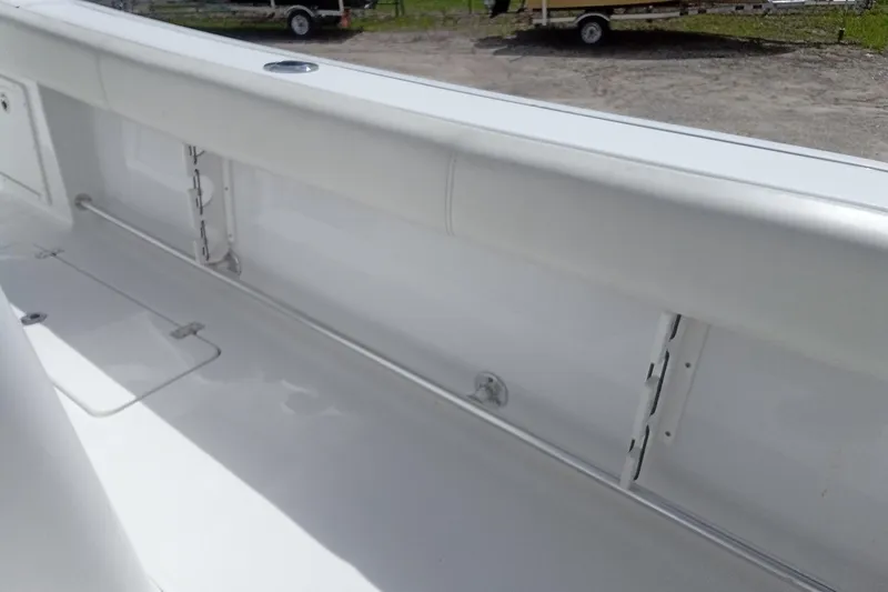 Slide: The Image of 2020 Sportsman Open 282TE Center Console interior detail, showcasing sleek white design. - 8