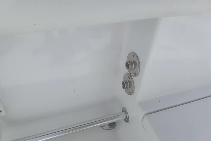 Slide: The Image of 2020 Sportsman Open 282TE Center Console boat fittings and rail detail. - 9