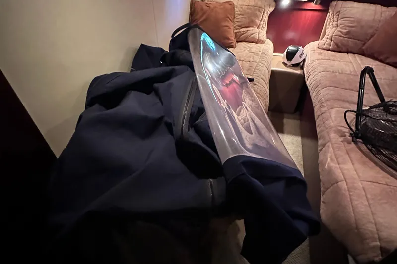 Slide: The Image of Luxurious interior of 2005 Sea Ray 48 Sundancer yacht with modern amenities and seating. - 29