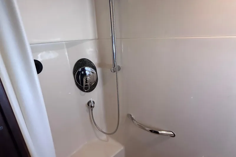 Slide: The Image of Dashboard of 2005 Sea Ray 48 Sundancer with Garmin navigation displays. - 31