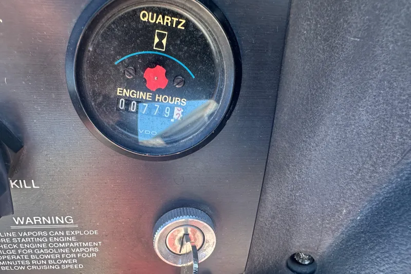 Slide: The Image of 1987 MasterCraft ProStar 190 engine hour meter showing 779.5 hours. - 6