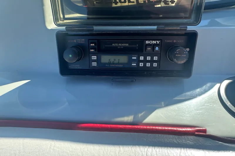 Slide: The Image of 1987 MasterCraft ProStar 190 dashboard with Sony auto-reverse cassette player. - 7