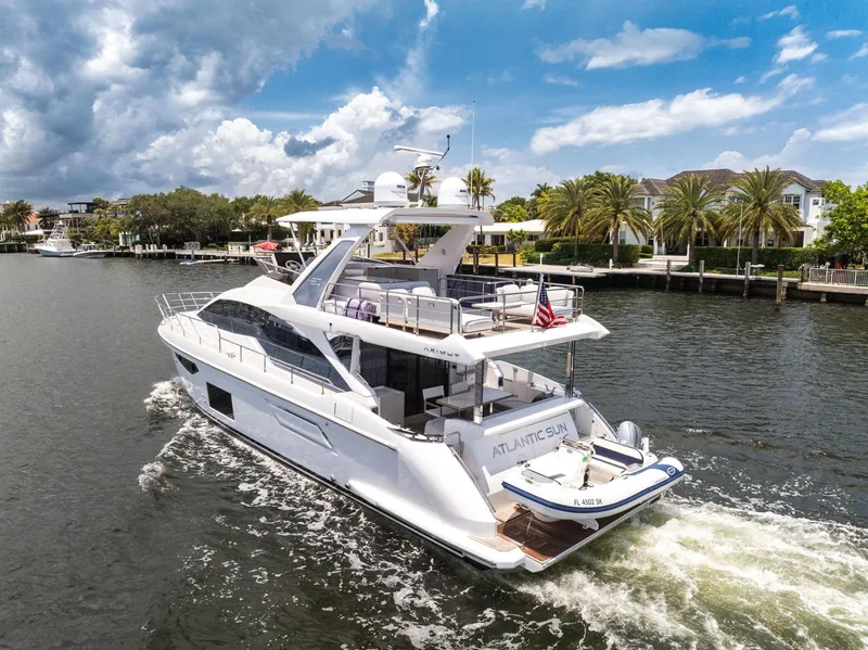 Slide: The Image of Azimut Fly 60 yacht cruising on a sunny day, 2022 model. - 16