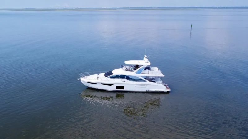 Slide: The Image of Azimut Fly 60 yacht from 2022 cruising on calm waters. - 24