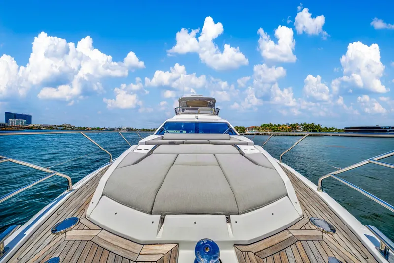 Slide: The Image of 2022 Azimut Fly 60 yacht on water, showcasing luxurious deck and scenic ocean view. - 26