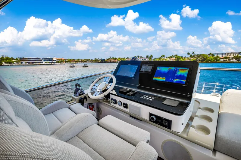 Slide: The Image of Luxurious 2022 Azimut Fly 60 yacht cockpit with advanced navigation systems. - 35