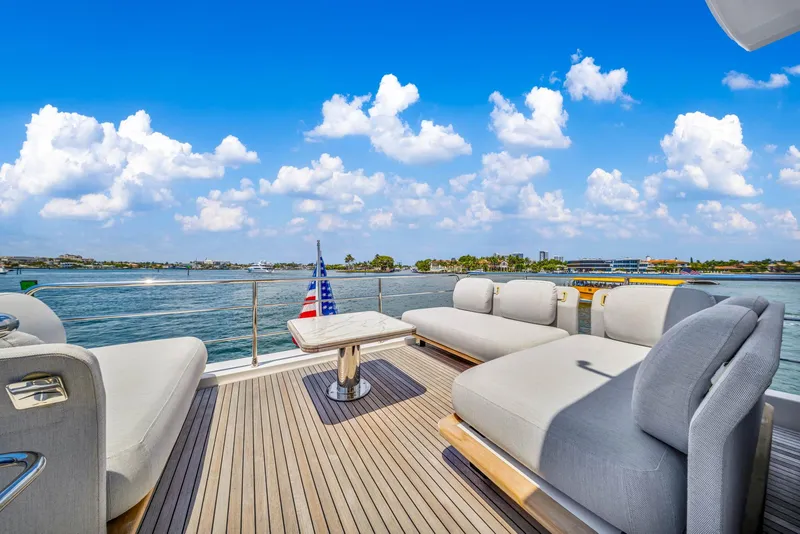Slide: The Image of Luxurious deck of 2022 Azimut Fly 60 yacht with plush seating and scenic ocean view. - 42