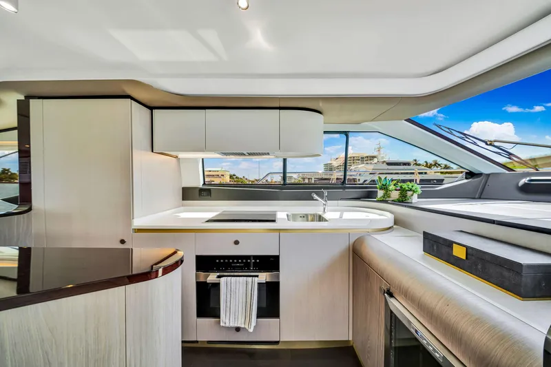 Slide: The Image of Modern kitchen interior of 2022 Azimut Fly 60 yacht with sleek design and panoramic windows. - 45