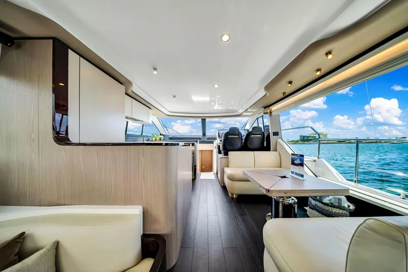 Slide: The Image of Luxurious interior of 2022 Azimut Fly 60 yacht with modern furnishings and ocean view. - 46