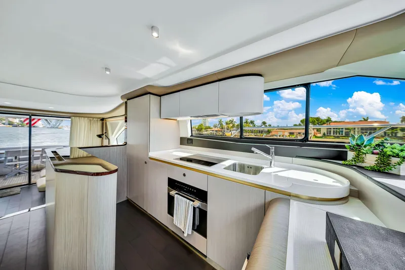 Slide: The Image of Luxurious interior of 2022 Azimut Fly 60 yacht with modern kitchen and scenic views. - 47