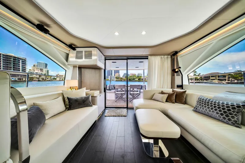 Slide: The Image of Luxurious interior of 2022 Azimut Fly 60 yacht with modern furnishings and waterfront view. - 49