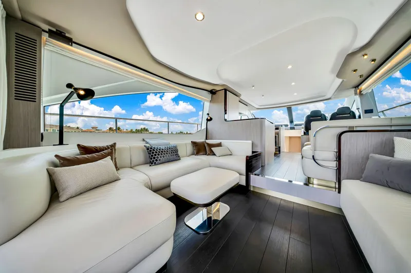 Slide: The Image of Luxurious interior of 2022 Azimut Fly 60 yacht with modern furnishings and panoramic windows. - 50
