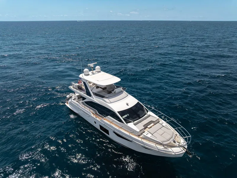 Slide: The Image of 2022 Azimut Fly 60 yacht cruising on open ocean waters. - 8