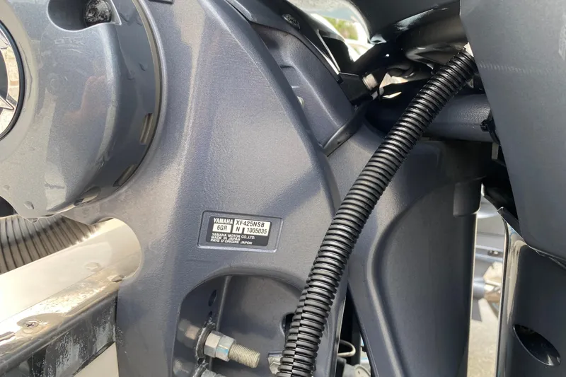 Slide: The Image of Close-up of a Yamaha XF425SNB engine on a 2021 Grady-White Freedom 335 boat. - 21