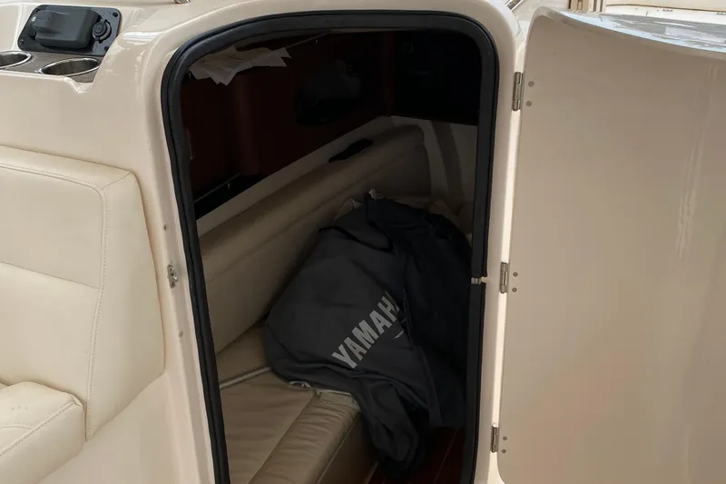 Slide: The Image of 2021 Grady-White Freedom 335 cabin interior with Yamaha jacket. - 7