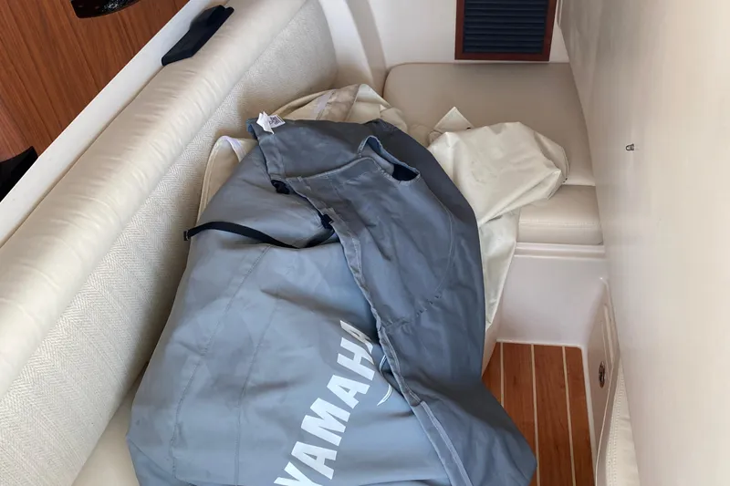 Slide: The Image of Interior of 2021 Grady-White Freedom 335 boat with Yamaha cover on seat. - 8
