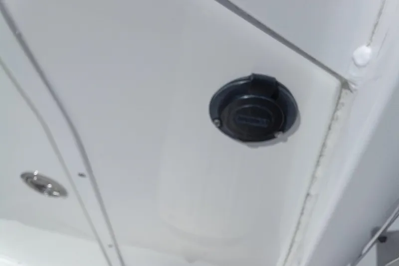 Slide: The Image of 2019 Sea Hunt Ultra 255 SE boat interior detail with electrical outlet. - 30